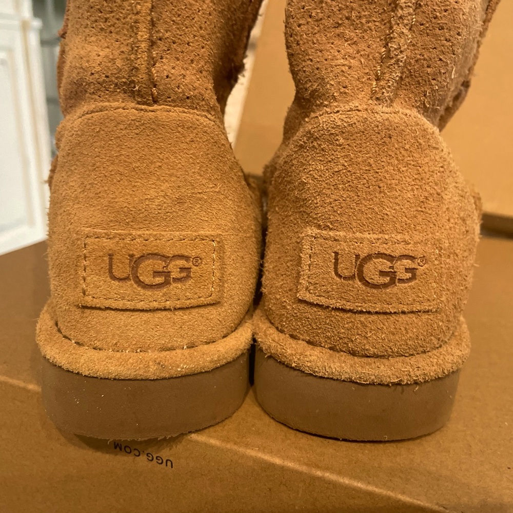 Authentic UGG size 8 Woman's Classic unlined mini perf boots.